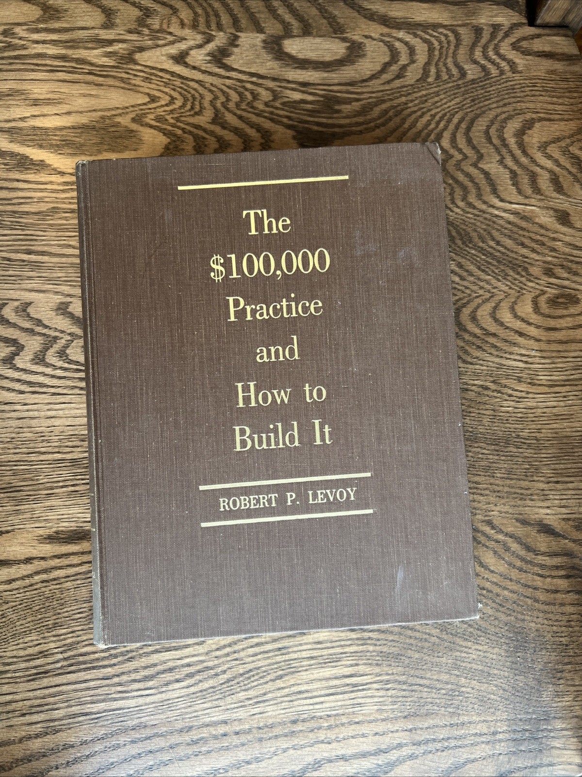 The $100,000 practice and how to build it by Robert P Levoy