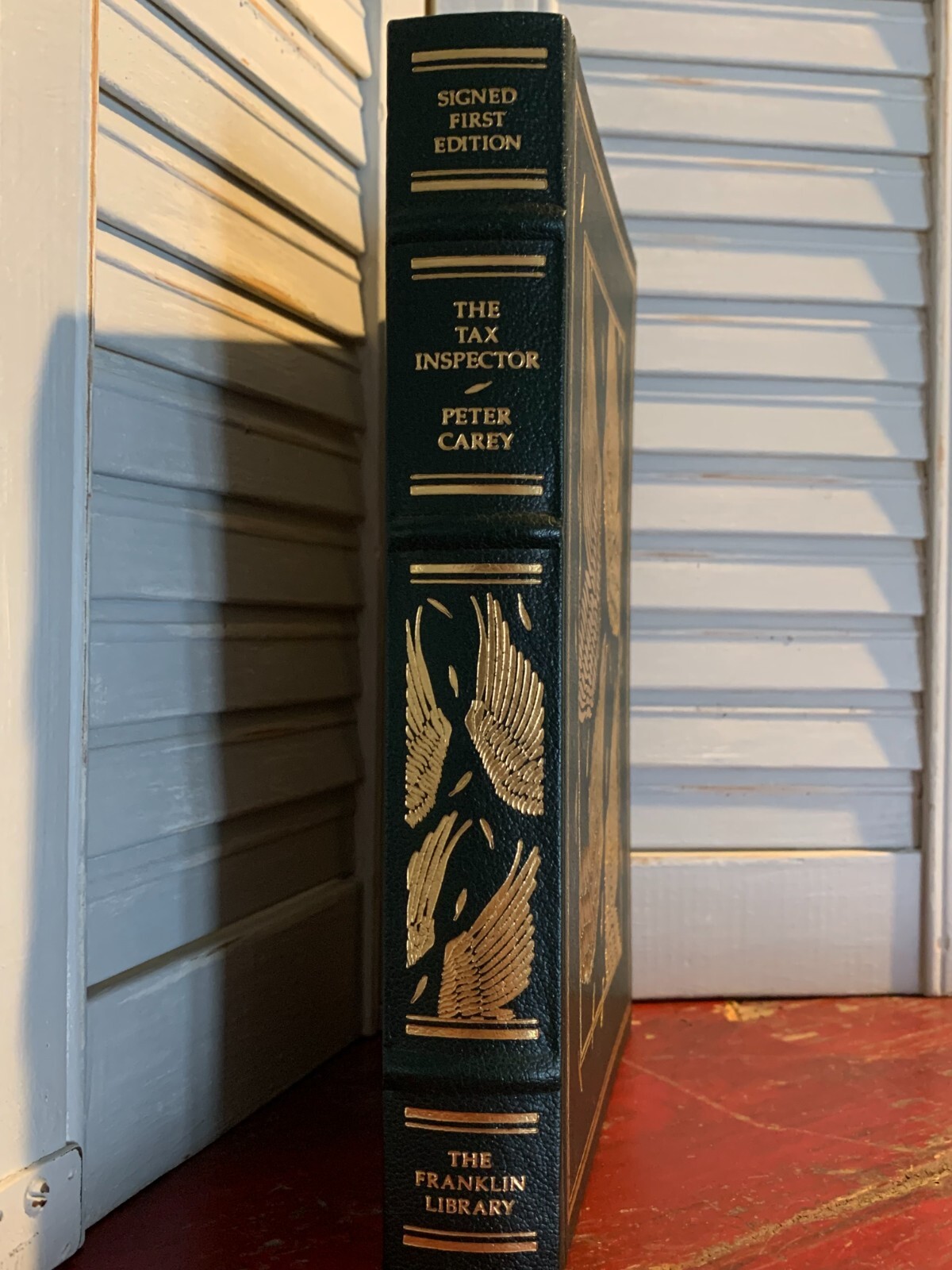 SIGNED – THE TAX INSPECTOR by Peter Carey (Franklin Library, 1991) + Letter