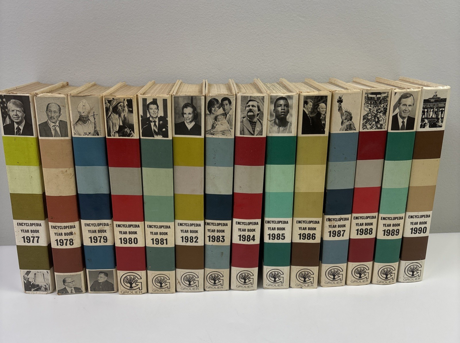Encyclopedia Year Books by Grolier Hardcover Books Pictures 1977-1990 Lot of 14